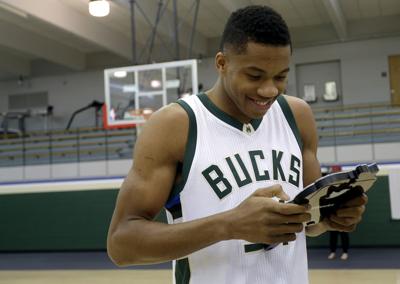 Giannis Antetokounmpo smiling 2016, AP photo