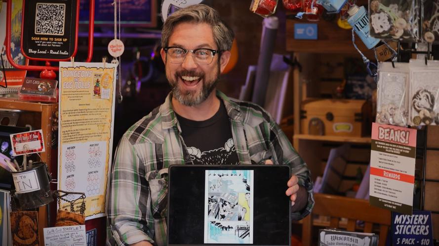 Scherer poses with Nelson Daniel illustration