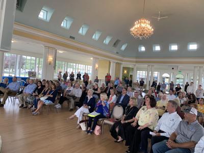 A crowd of people attend the Riviera dedication ceremony, July 15