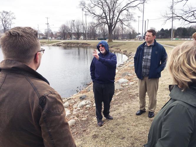 Echo Lake steering committee member Paul Haynes addresses colleagues at the lake