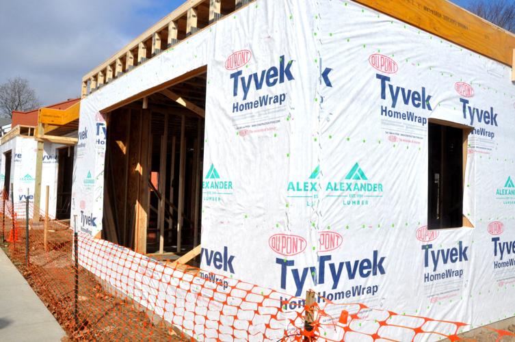 The exterior walls of a two-story building at 323 Broad St. continued to be a work in progress