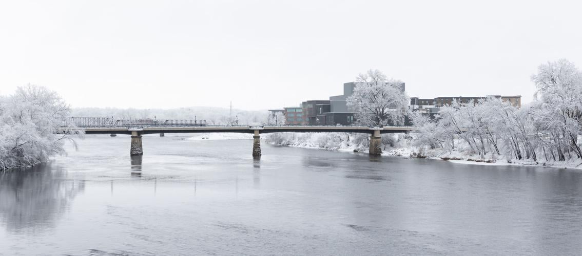 Heavy snow leads to broken trees, power outages, slower plowing in Eau