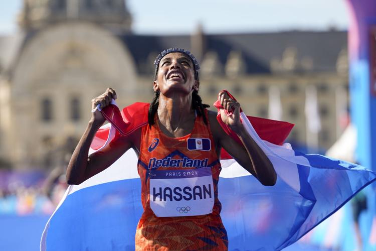 Sifan Hassan wins women's marathon at Paris Olympics after trading