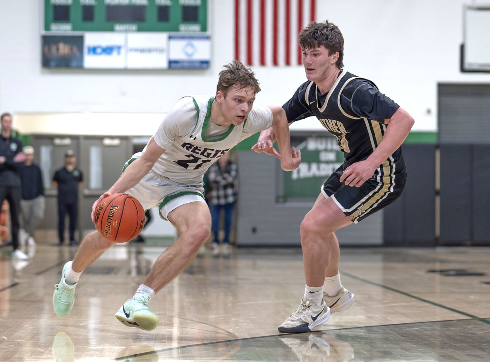 Risler erupts for 56 points to lead Regis boys to regional title ...