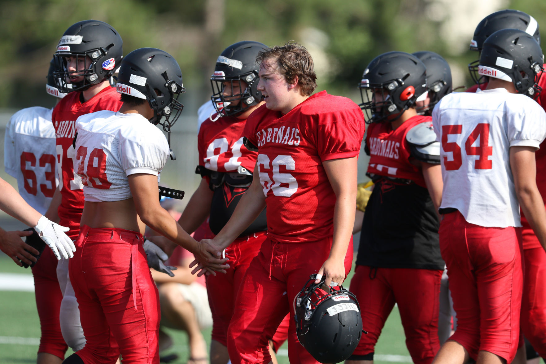 Prep football Raykovich working with largest group he s ever had