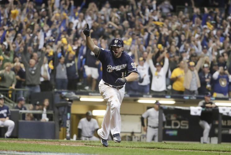 MLB playoffs: Brewers win NLDS Game 1 on Mike Moustakas walk-off