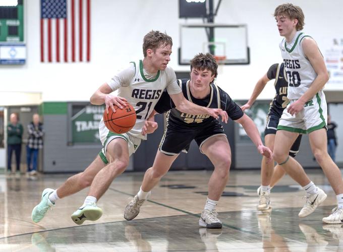 Risler erupts for 56 points to lead Regis boys to regional title ...