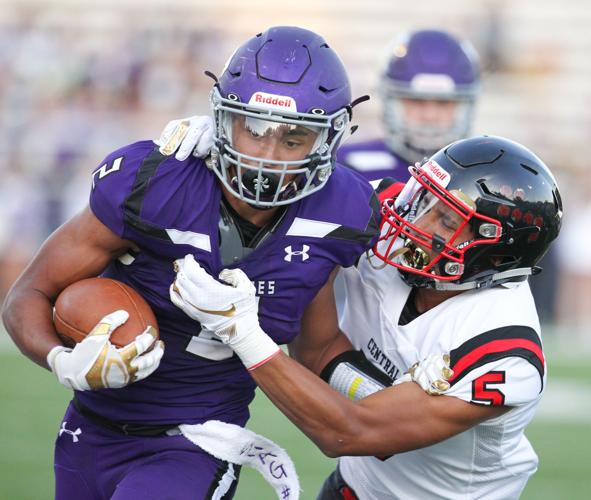 Prep football Memorial's Crawford officially signs with Wisconsin