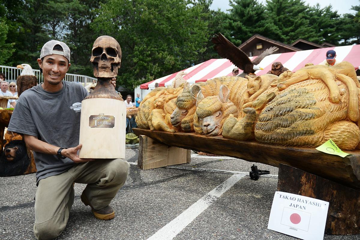 Japanese artist leaves sharp impression at chainsaw carving contest