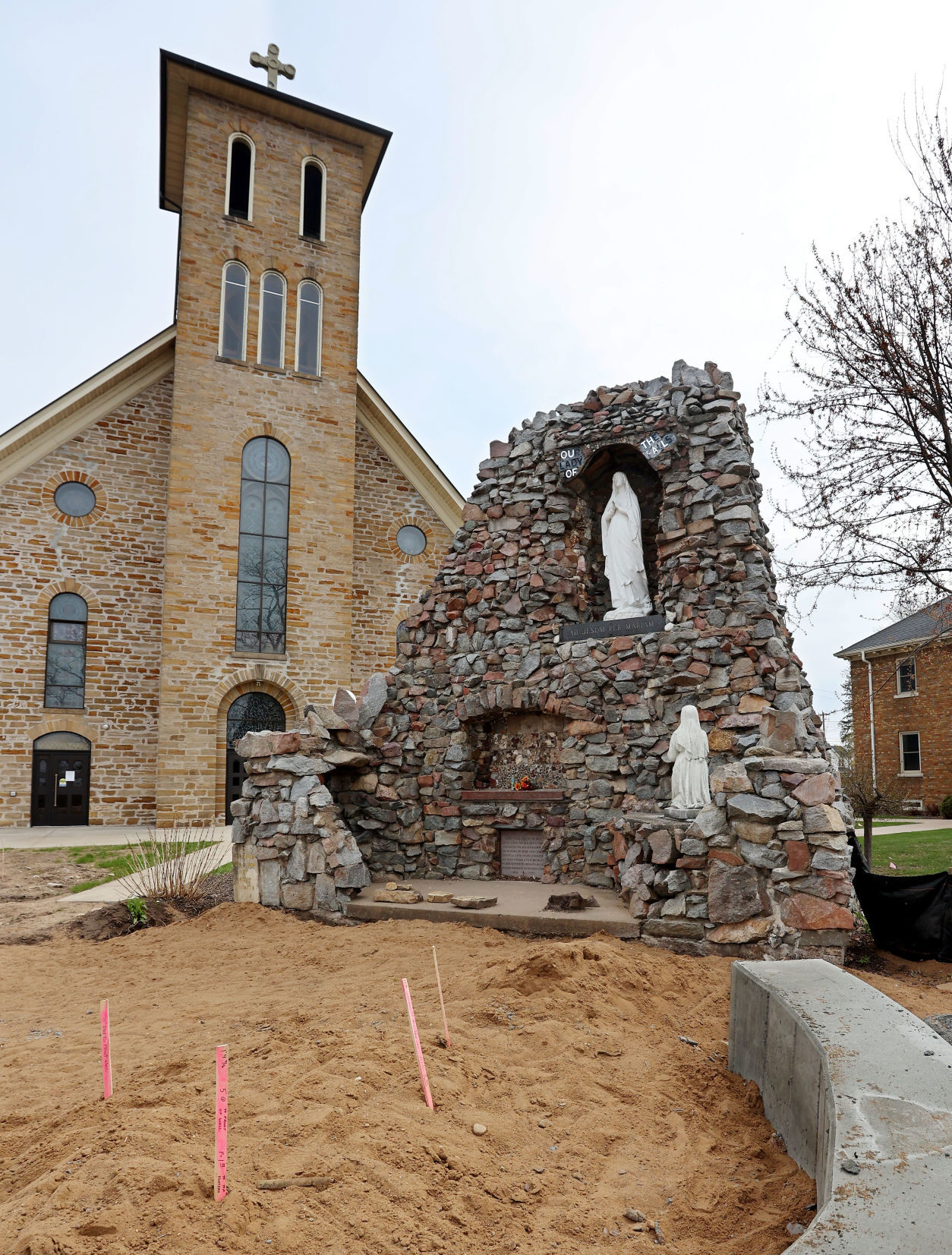 Notre Dame church restoring statue garden improving landcape