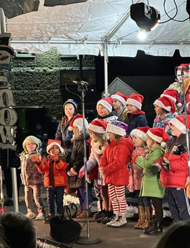Students sing for the holiday season