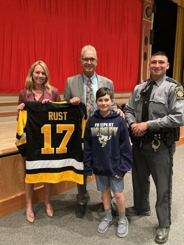 Autographed Bryan Rust jersey presented to student