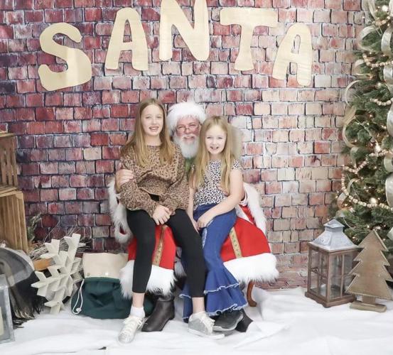 Downtown Alliance holds Santa Saturday gives free pictures of Santa