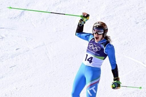 Federica Brignone celebrates winning her second gold medal of the 2026 Winter Olympics with her giant slalom triumph