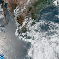 Tourists, fishermen hunker as Hurricane Erick pounds Mexican coast