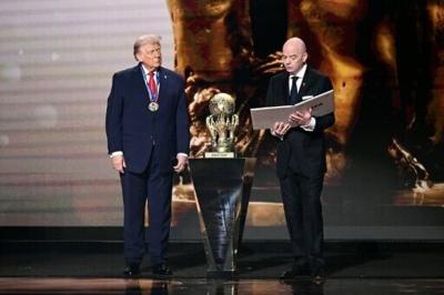 FIFA president Gianni Infantino (L) created a FIFA peace prize and awarded it to US President Donald Trump