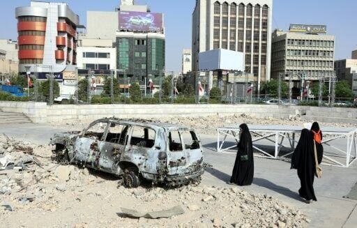 Iran said it fired missiles at a ӽAPP base in Qatar, while Israeli strikes continued to pound Tehran on the war's 11th day