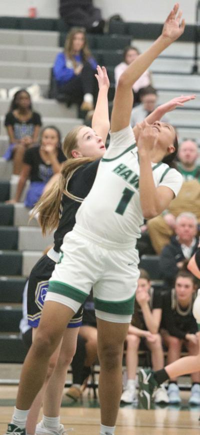 Lady Hawks’ road show plays well in home, district opener
