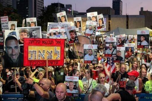 Demonstrators waved signs and held up pictures of hostages still being held in the Palestinian territory