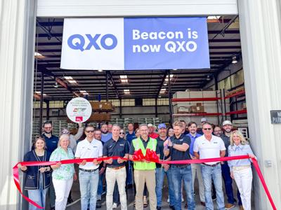 QXO ribbon cutting