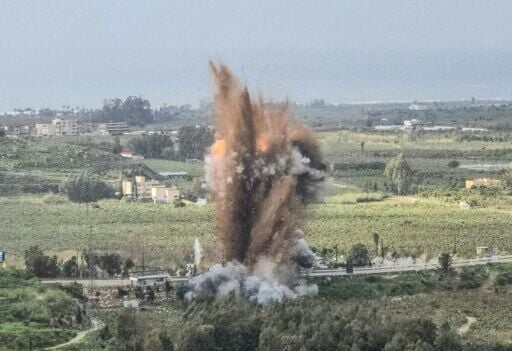 Smoke rises from an Israeli airstrike on the Qasmiyeh bridge in south Lebanon