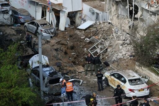 The site of an Iranian missile strike in Tel Aviv on March 24, 2026