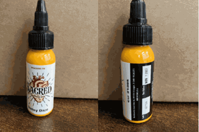 A photo of the affected Sacred Tattoo Ink in the color Sunny Daze
