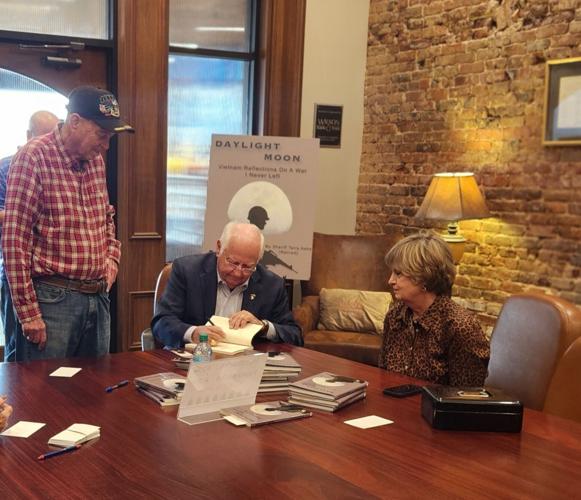 ashe signing for bo.jpg