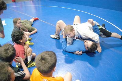 Wrestling coaches hope to bring Greco-Roman to Lee