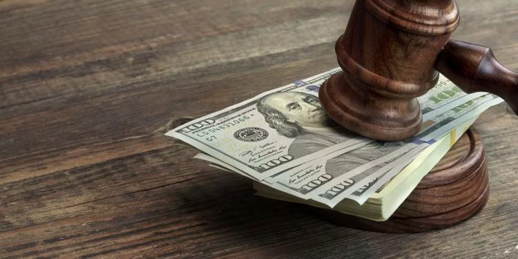 Overtime retaliation case stayed, sent to arbitration