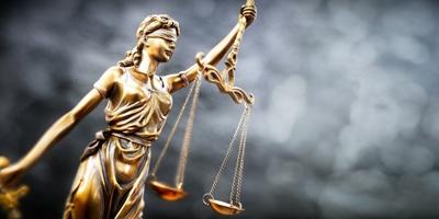 Legal and law concept statue of Lady Justice with scales of justice