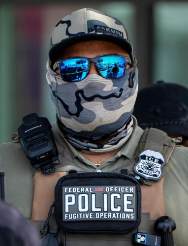 ICE agents and FHP troopers at the El Quetzal Panaderia Y Cafeteria on July 9, 2026 in Lake Worth Beach, Florida.