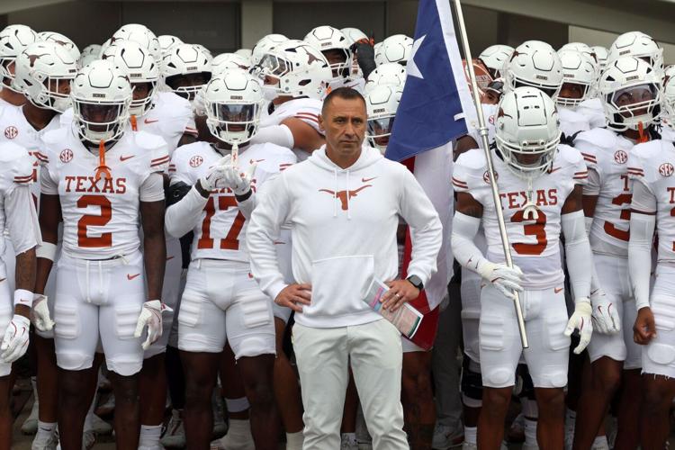 Texas Longhorns coach Steve Sarkisian waits to lead his team onto the field prior to the game against the Mississippi State Bulldogs at Davis Wade Stadium at Scott Field.