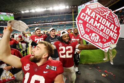Najee Harris of the Alabama Crimson Tide celebrates following the College Football Playoff National Championship game win over the Ohio State Buckeyes at Hard Rock Stadium on Jan. 11, 2021 in Miami Gardens, Florida.