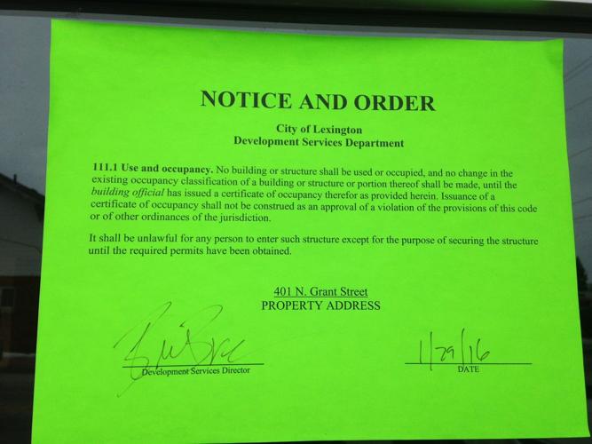 Notice on Islamic Center door from City of Lexington