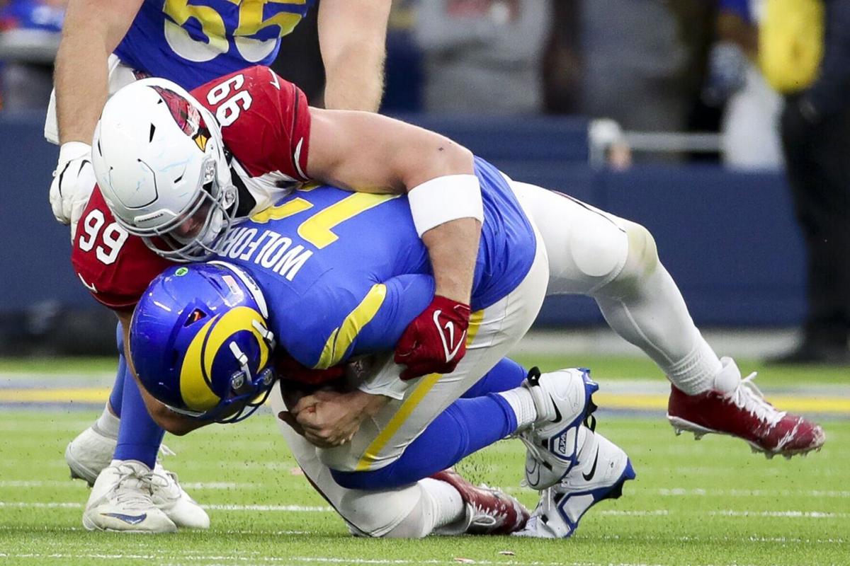 Arizona Cardinals defensive end J.J. Watt sacks Los Angeles Rams quarterback John Wolford during the second half at SoFi Stadium on Sunday, Nov. 13, 2022, in Los Angeles.