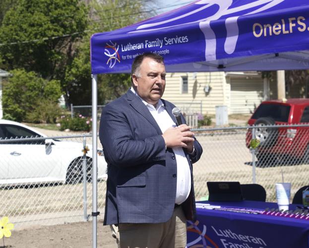Chris Tonniges speaks during the grand opening