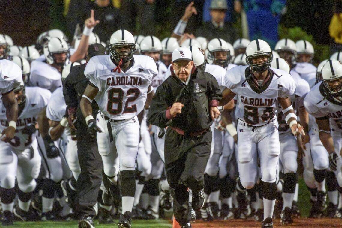 Lou Holtz leads his team onto the field in 1999 for his first game as the head coach of The University of South Carolina.