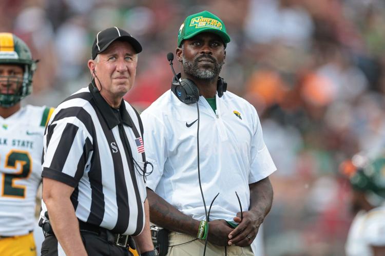 Norfolk State Spartans head coach Michael Vick look up during the first half against the Rutgers Scarlet Knights at SHI Stadium.