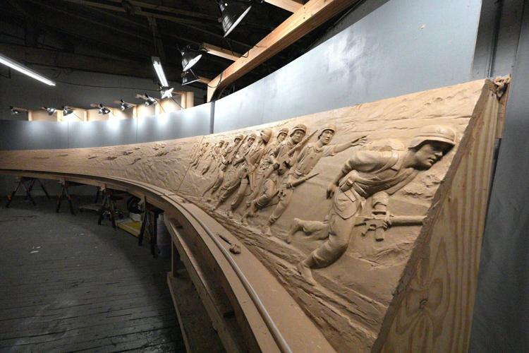 Emily Bedard, art director and lead scupltor for Foster Reeve, and artist behind the Desert Shield and Desert Storm Memorial, with her original clay creation of the memorial in her studio at the Garnerville Arts Center April 2, 2026.