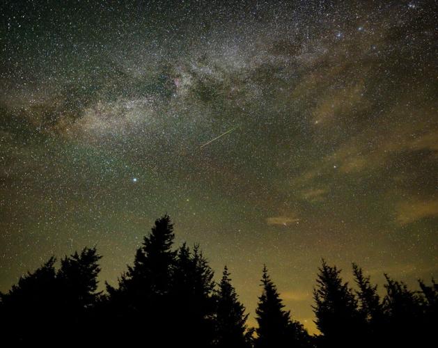 In this 30-second exposure, a meteor streaks across the sky during the annual Perseid meteor shower Aug. 11, 2021, in Spruce