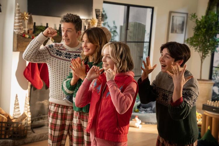 Left to right, Ed Helms as Bill, Jennifer Garner as Jess, Emma Myers as CC, and Brady Noon as Wyatt in "Family Switch."