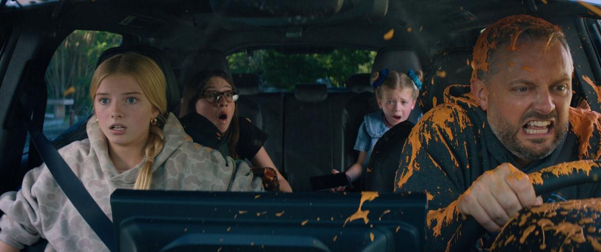 Nate (Nate Bargatze) has a messy mishap trying to drive his daughters (Stella Fitzgerald, Birdie Borria and Charlotte Tucker) to school in "The Breadwinner."