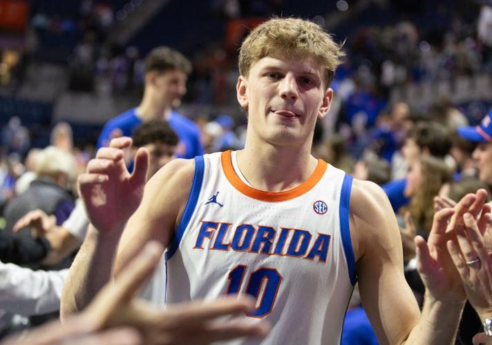 Florida forward Thomas Haugh (10) celebrates with fans after Florida beat LSU 79-61 at Steven C. O'Connell Center Exactek arena in Gainesville, FL on Tuesday, January 20, 2026. [Alan Youngblood/Gainesville Sun]