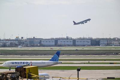 United Airlines and American Airlines planes at Chicago O'Hare International Airport