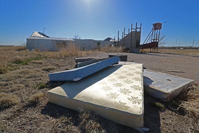 Resident asks commissioners for help cleaning up “eyesore” property near Darr I-80 interchange