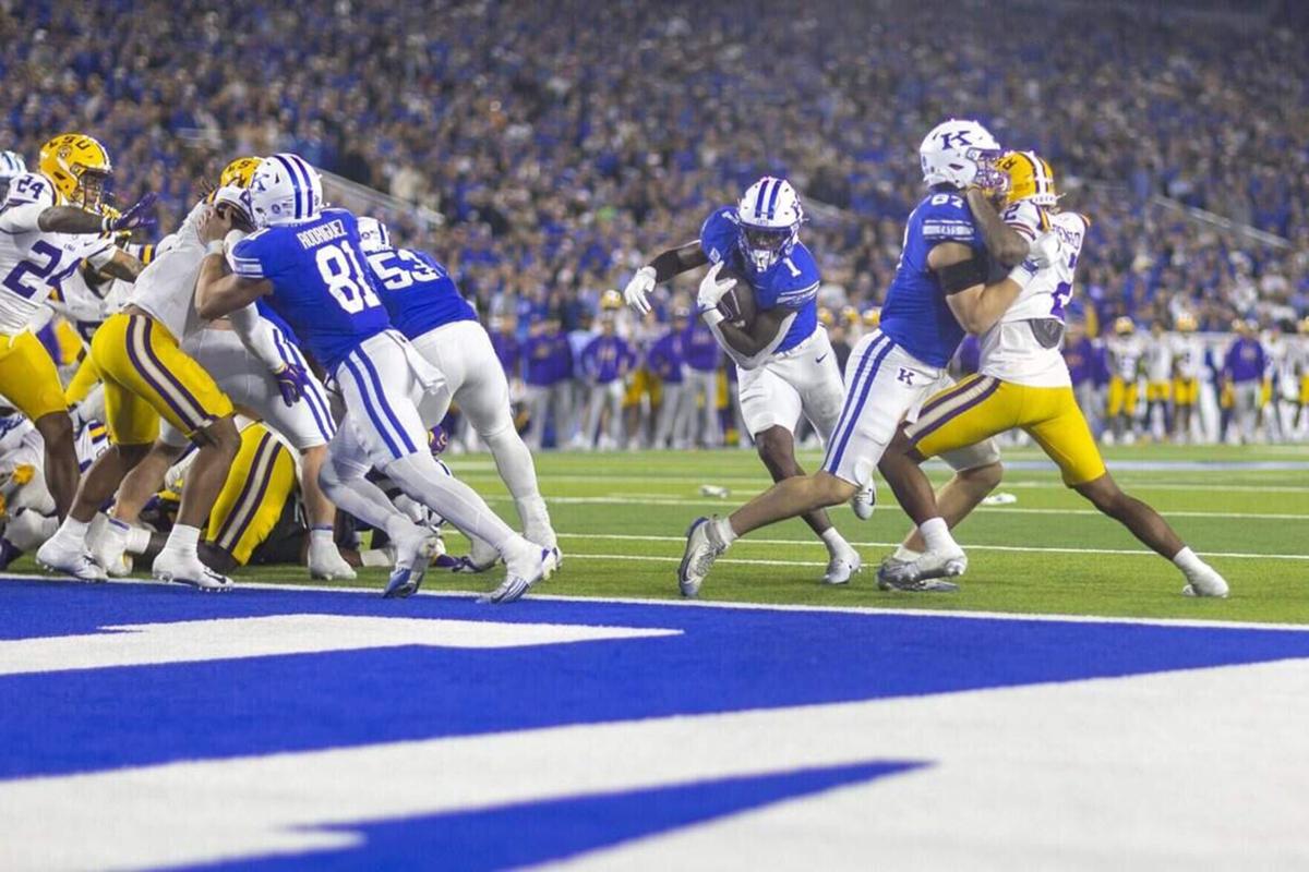 Kentucky Wildcats running back CJ Baxter runs the ball during overtime in a game against the Louisiana State Tigers at Kroger Field in Lexington, Ky., on Saturday, Oct. 10, 2026.