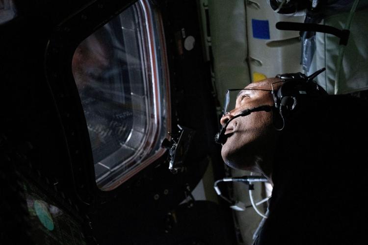 FILE PHOTO: NASA astronaut and Artemis II Pilot Victor Glover is pictured here in the Orion spacecraft during the Artemis II lunar flyby
