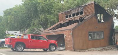 Fire crews battle structure fire at Johnson Lake