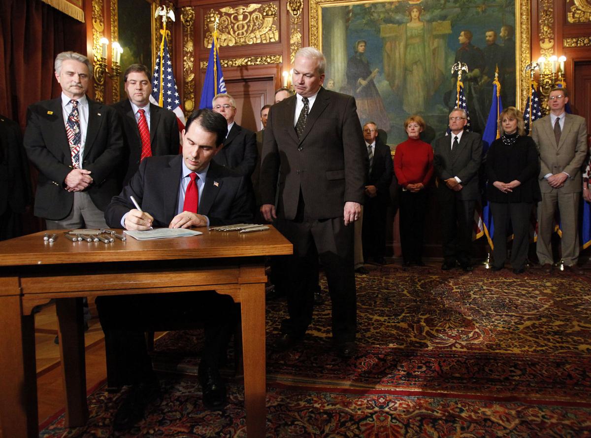 Walker signs bill